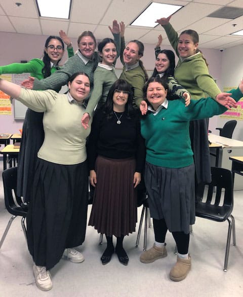 Mrs. Esti Abrams in the middle, and her students all around.